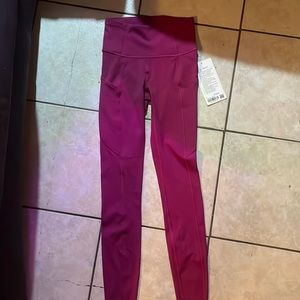 Brand new never worn lulu lemon tights 25” high rise length